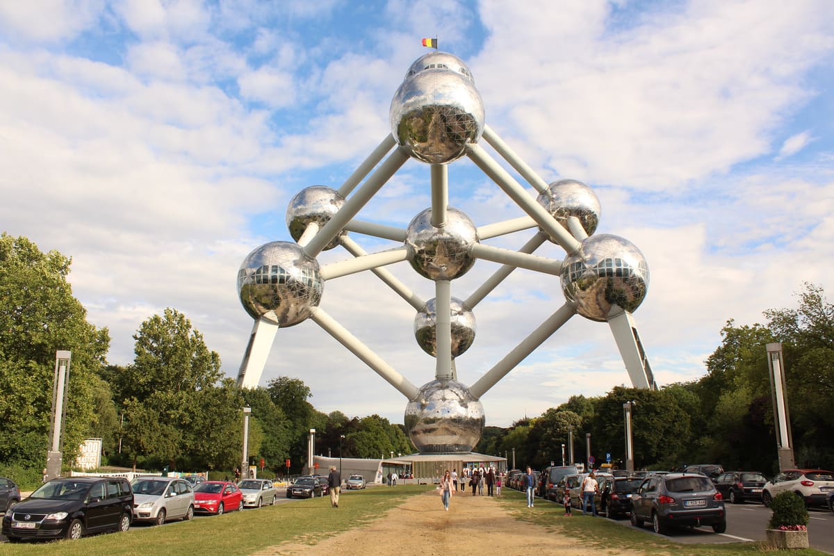The Atomium in Brussels — nine 18-metre stainless steel spheres arranged as the body-centred cubic unit cell of an iron crystal, scaled 165 billion times, built for the 1958 World's Fair.